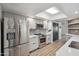 Modern kitchen equipped with stainless steel appliances, gray cabinets, and ample counter space at 2170 E Alameda Dr, Tempe, AZ 85282