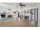 Expansive living room features wood floors, a fireplace, a wet bar, and an open layout at 2170 E Alameda Dr, Tempe, AZ 85282