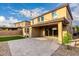 Backyard showcasing artificial turf, paver patio, sliding glass door and string lights at 21972 N 97Th Gln, Peoria, AZ 85383