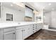 Large bathroom with double vanities and a separate walk-in shower at 21972 N 97Th Gln, Peoria, AZ 85383