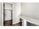 Home office features a built-in desk and walk-in closet space, perfect for remote work at 21972 N 97Th Gln, Peoria, AZ 85383