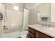 Cozy bathroom with shower, tub, and modern vanity with marble countertop at 22290 E Escalante Rd, Queen Creek, AZ 85142