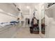 Bright, walk-in closet with organized shelving and ample storage space at 22290 E Escalante Rd, Queen Creek, AZ 85142