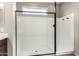 Modern bathroom featuring new shower with black trim and white interior at 23195 S 226Th Way, Queen Creek, AZ 85142