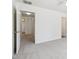 This bright bedroom features neutral carpet and lots of natural light at 2327 E Meadow Land Dr, San Tan Valley, AZ 85140