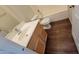 Bathroom with single sink vanity, laminate countertops, toilet, and tub shower at 23424 W Pima St, Buckeye, AZ 85326