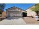 Single Gathering home with a two car garage, desert landscaping, and a for rent sign at 23424 W Pima St, Buckeye, AZ 85326
