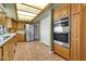 Updated kitchen with stainless steel appliances, ample cabinet space, and a convenient layout at 2346 E Jasmine St, Mesa, AZ 85213