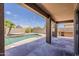 Inviting backyard features a covered patio, built in grill and a sparkling pool at 2408 W Saint Kateri Dr, Phoenix, AZ 85041