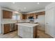 Kitchen featuring stainless steel appliances, a large island, modern countertops, and ample cabinet space at 2408 W Saint Kateri Dr, Phoenix, AZ 85041