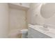 Bathroom featuring a shower and sink with white cabinet at 2920 W Michigan Ave, Phoenix, AZ 85053