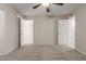 Bedroom with carpet and two entrances/doors at 2920 W Michigan Ave, Phoenix, AZ 85053