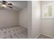 Bedroom featuring neutral walls, carpet, and a window with white shutters at 2920 W Michigan Ave, Phoenix, AZ 85053