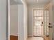 Home entryway with tile flooring and a decorative front door with security screen at 2920 W Michigan Ave, Phoenix, AZ 85053