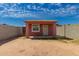 Charming guesthouse with window and door, situated in a spacious lot, offering additional living space at 2936 E Willetta St, Phoenix, AZ 85008