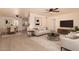 Bright and airy living room featuring a ceiling fan, plush seating, and modern decor for comfortable living at 2936 E Willetta St, Phoenix, AZ 85008