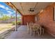 Covered patio with a table and chairs for outdoor seating at 2936 E Willetta St, Phoenix, AZ 85008