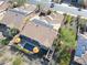 Aerial view showcasing solar panels, a pool, lush landscaping, and outdoor seating areas at 29749 N 130Th Dr, Peoria, AZ 85383