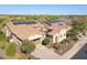 Beautiful home featuring a tile roof, solar panels, desert landscaping, and a spacious driveway at 29749 N 130Th Dr, Peoria, AZ 85383