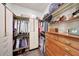 Walk-in closet with custom shelving and ample storage space at 29749 N 130Th Dr, Peoria, AZ 85383