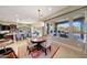 The dining area features large windows with backyard views at 29749 N 130Th Dr, Peoria, AZ 85383