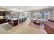 Open-concept kitchen features stainless steel appliances, granite countertops, and a center island with seating at 29749 N 130Th Dr, Peoria, AZ 85383