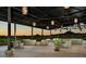 Spacious outdoor patio area featuring comfortable seating, stylish lighting, and scenic mountain views at 29749 N 130Th Dr, Peoria, AZ 85383