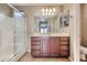 Bathroom featuring shower and a wood vanity with double drawers for storage at 2994 E Megan St, Gilbert, AZ 85295