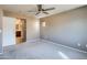 Neutral bedroom showcasing an en-suite bathroom at 2994 E Megan St, Gilbert, AZ 85295