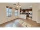 Eat-in kitchen with stainless appliances, granite counters, and wood cabinets at 2994 E Megan St, Gilbert, AZ 85295