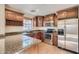 Gourmet kitchen featuring granite countertops and stainless steel appliances at 2994 E Megan St, Gilbert, AZ 85295