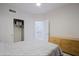 The bedroom features a ceiling fan and closet, and is brightly lit at 32472 N 68Th Pl, Scottsdale, AZ 85266