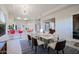 Bright, open floorplan with kitchen bar, dining area, and access to outdoor living at 32472 N 68Th Pl, Scottsdale, AZ 85266