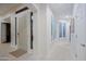 Bright and open entryway with tile flooring, white walls, and ample natural light at 32472 N 68Th Pl, Scottsdale, AZ 85266