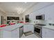 A well lit kitchen featuring granite countertops, modern appliances and open design at 32472 N 68Th Pl, Scottsdale, AZ 85266
