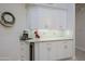 Kitchen boasts granite countertops, sleek white cabinetry, and a built-in wine cooler at 32472 N 68Th Pl, Scottsdale, AZ 85266