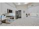 Modern kitchen featuring custom white cabinets, granite countertops, and stainless-steel appliances at 32472 N 68Th Pl, Scottsdale, AZ 85266