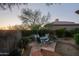 Outdoor patio with a dining table and chairs, perfect for enjoying the beautiful desert scenery at 32472 N 68Th Pl, Scottsdale, AZ 85266