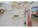Walk-in closet with shelves and hanging racks at 32472 N 68Th Pl, Scottsdale, AZ 85266