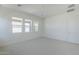 Sunlit bedroom featuring multiple windows and neutral carpeting at 35524 N Tin Ct, San Tan Valley, AZ 85144