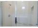 Close-up of tiled shower with glass door and chrome fixtures at 35524 N Tin Ct, San Tan Valley, AZ 85144