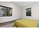 A bright bedroom with hardwood floors and nice windows at 358 E Whitton Ave, Phoenix, AZ 85012