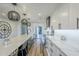 Spacious kitchen with quartz countertops, stainless steel appliances, and trendy globe pendant lights at 36601 N Mule Train Rd # D1, Carefree, AZ 85377