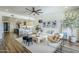 Inviting living room is open to the kitchen and features stylish decor, comfortable seating, and lots of light at 36601 N Mule Train Rd # D1, Carefree, AZ 85377