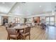 Spacious lounge offers lots of seating, a cozy fireplace, and attractive wood-style flooring at 36601 N Mule Train Rd # D1, Carefree, AZ 85377