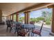 Covered outdoor patio area provides comfortable seating and scenic views of the surrounding landscape at 36601 N Mule Train Rd # D1, Carefree, AZ 85377