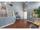 Two-story foyer featuring hardwood floors, chandelier, stairway, and light gray walls at 3679 S Cottonwood Ct, Chandler, AZ 85286