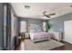 Bright main bedroom with a large window, a plush rug, and neutral decor at 3679 S Cottonwood Ct, Chandler, AZ 85286