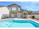 Backyard with a refreshing pool, rock landscaping, and patio area at 3755 E Broadway Rd # 21, Mesa, AZ 85206
