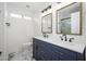 Bathroom features double sink vanity, marble floors, and modern fixtures at 3755 E Broadway Rd # 21, Mesa, AZ 85206